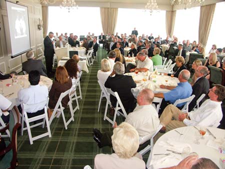 Co-workers, industry associates, friends and family members gathered June 30 to pay their respects and celebrate John DeFrehns life. Ranger Central Division President Mike Slade gave the eulogy. (Photo by Carl Thiemann)